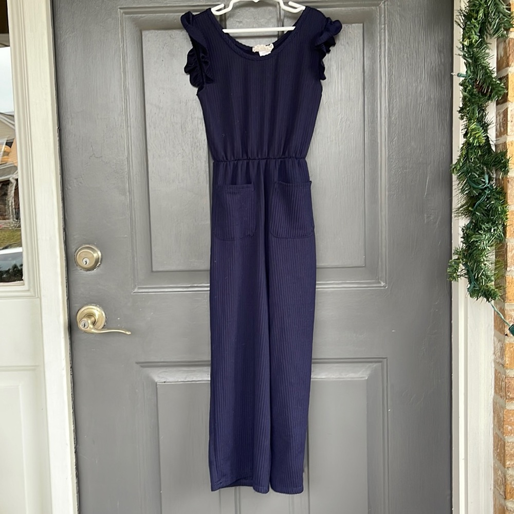 Pinc navy blue jumpsuit with ruffled sleeve. Excellent condition